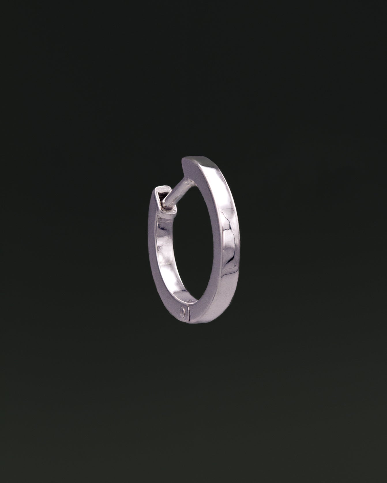 Small Hoop earring in recycled 14K white gold with a click-closure design.