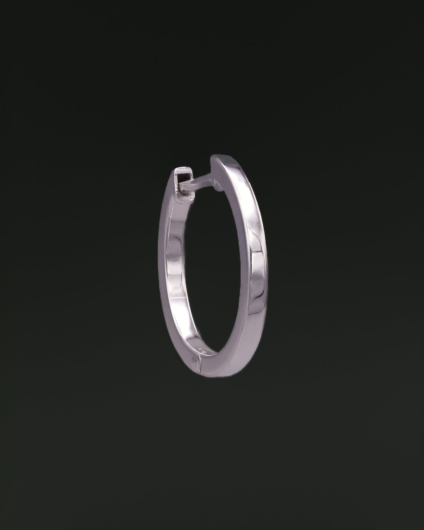 Medium Hoop earring in recycled 14K white gold with a click-closure design.